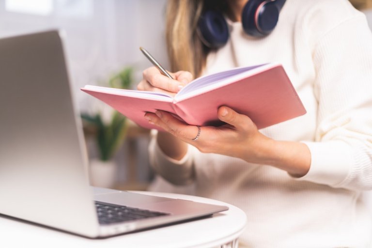 business-woman-writing-typing-laptop-learning-work-notebook-books-distance-coffee-cup-freelance_t20_rLnQ7d.jpg